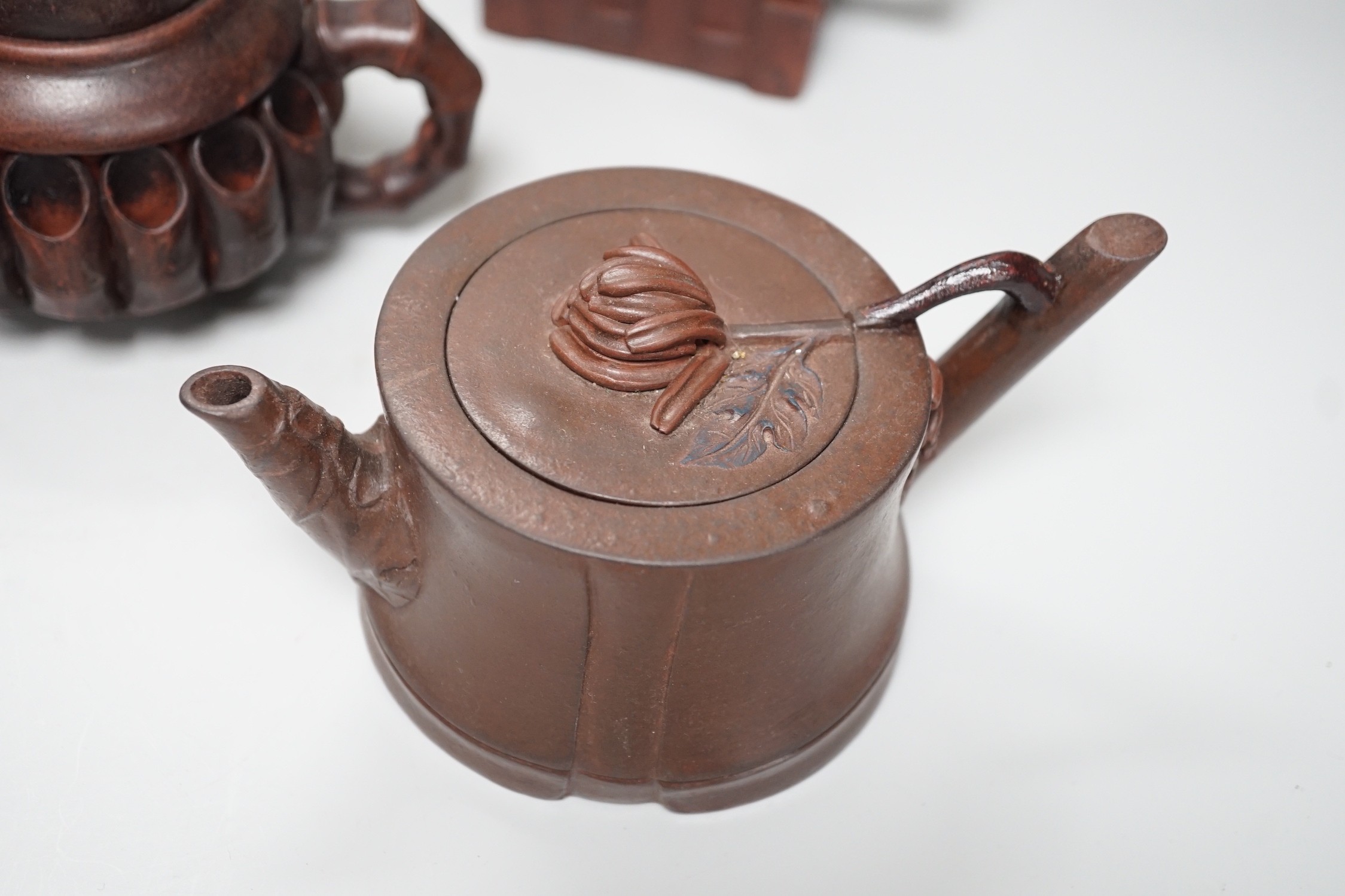 A collection of five Chinese Yixing teapots, tallest 6.5cms high